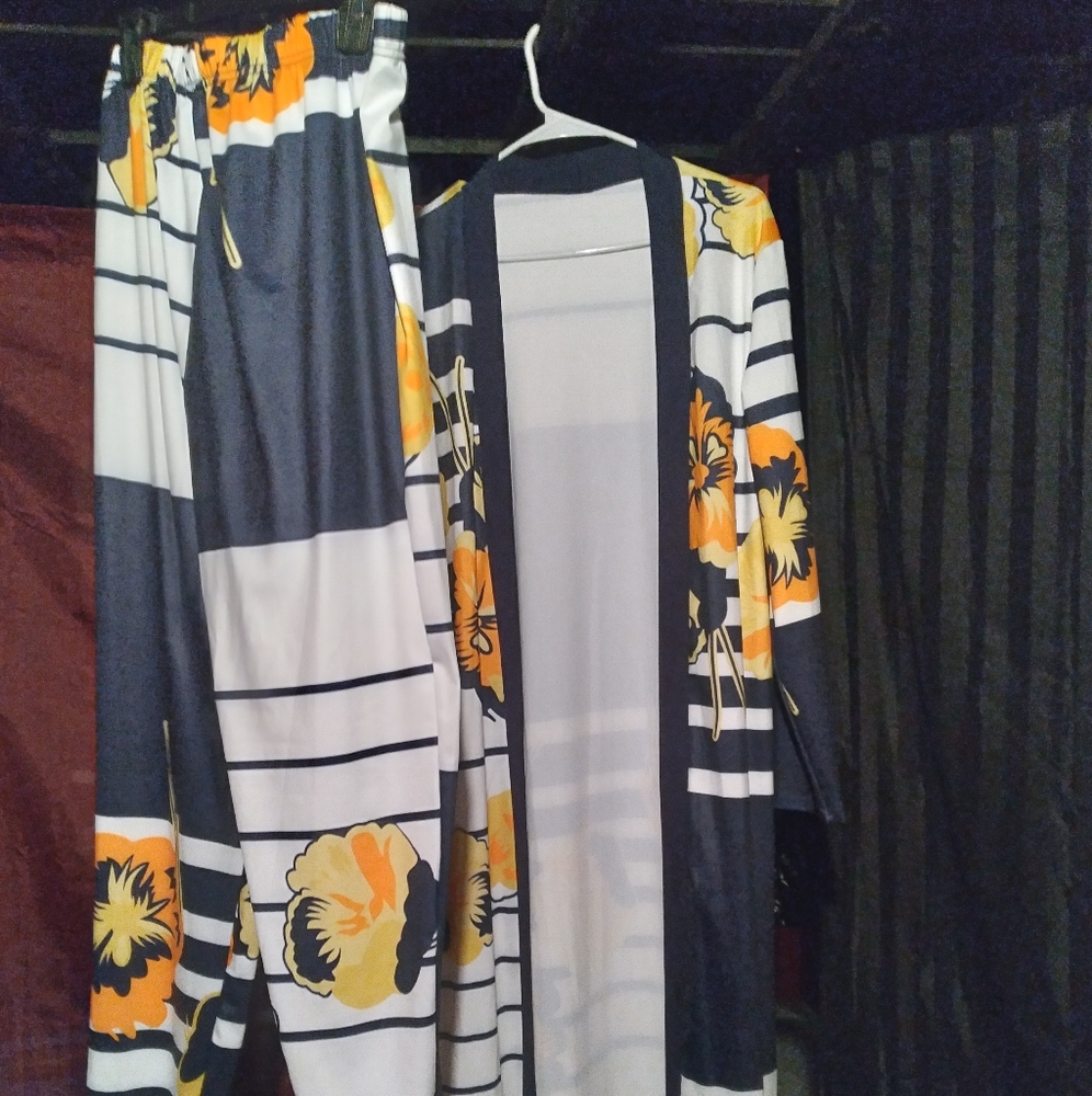 2 piece overcoat & pants sets both sets are $20 a piece not together